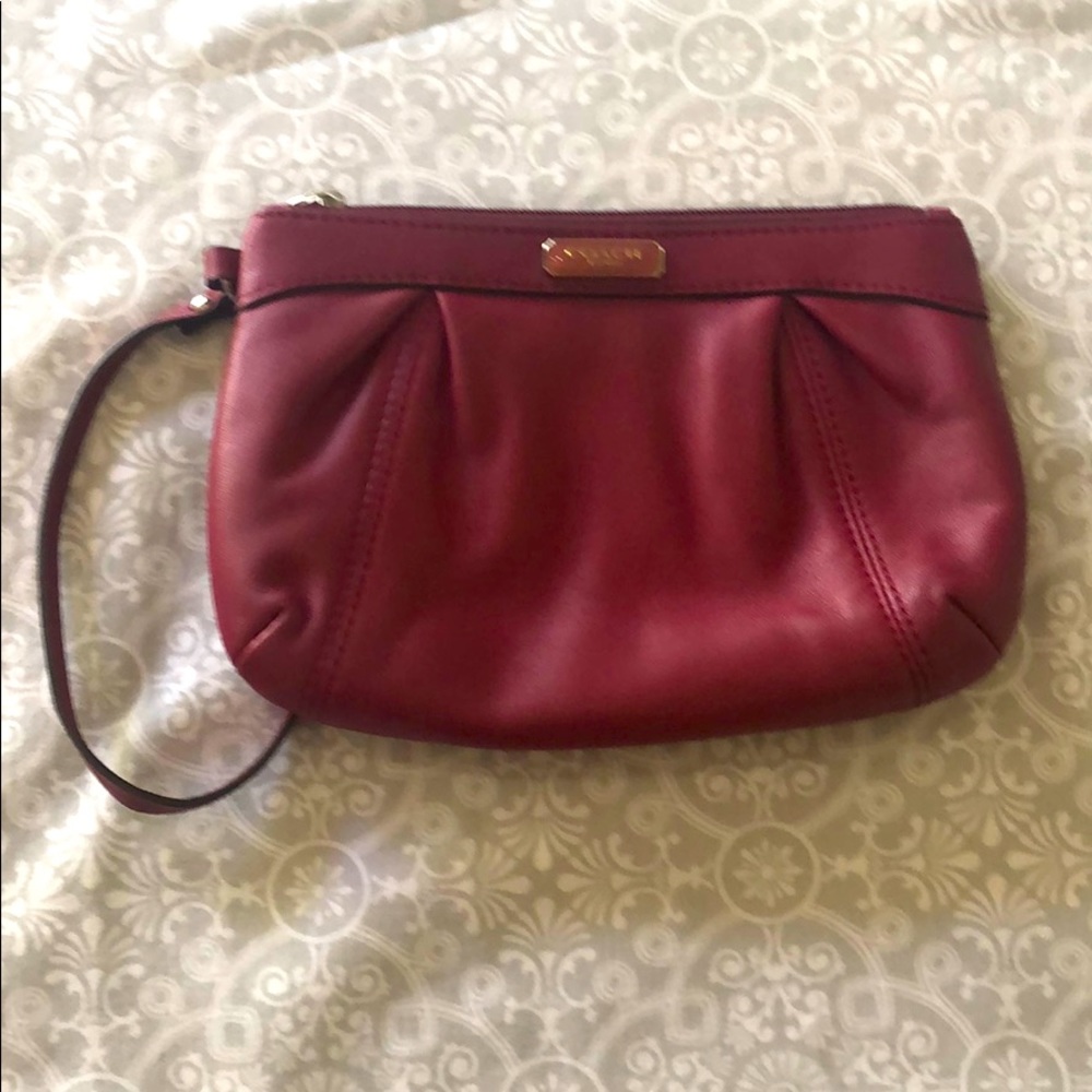 Coach wristlet. Beet color. Excellent condition.